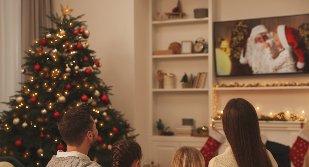 A family watch Christmas TV