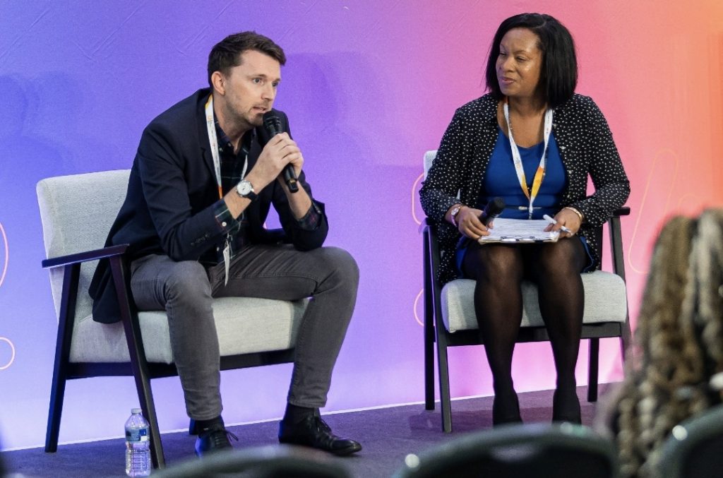 Louise Chandler hosting an event at the Excel Centre about franchising